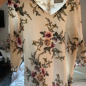 White and floral dress.